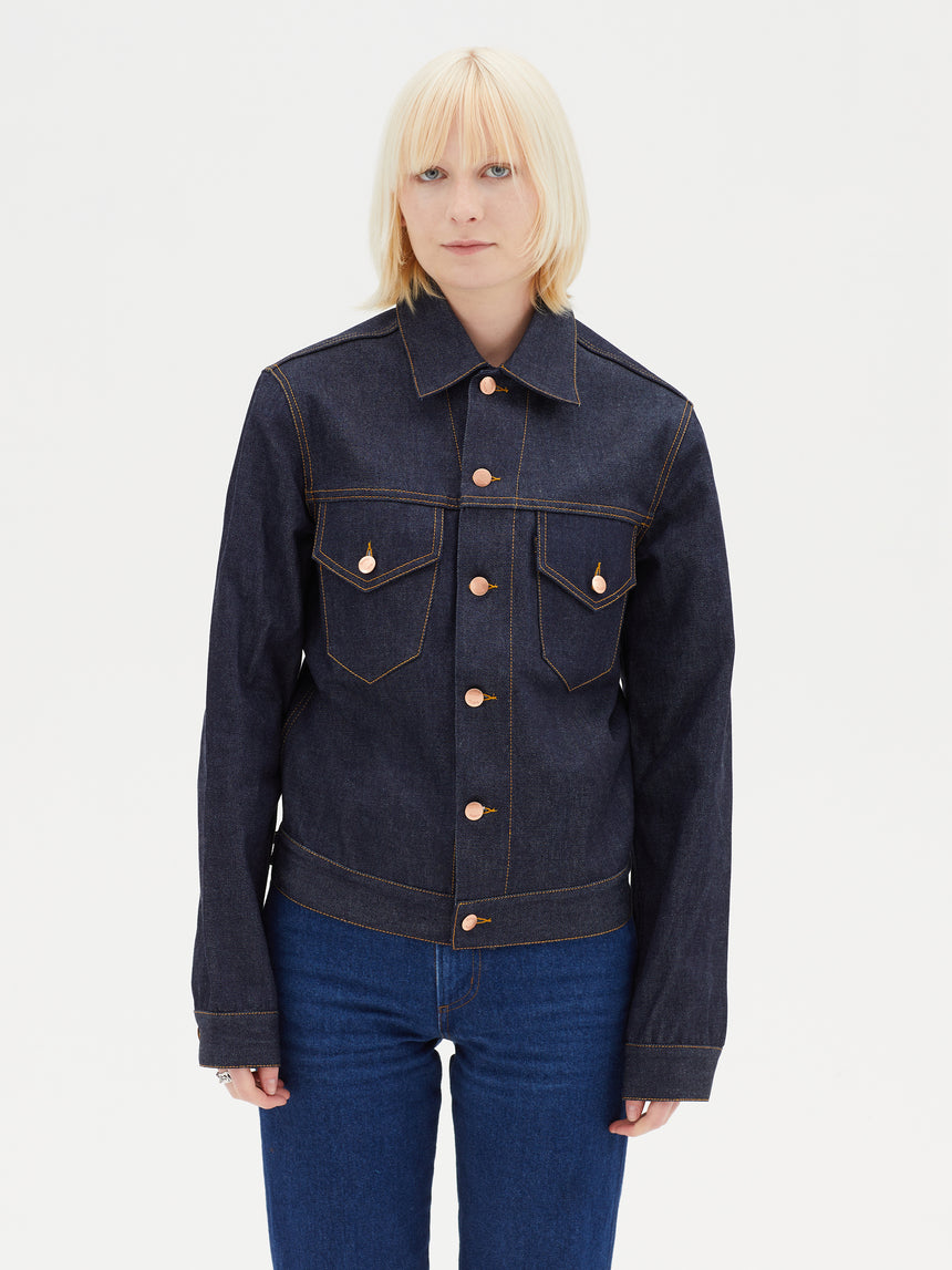 TAILORED DENIM TRUCKER JACKET IN RAW INDIGO DENIM