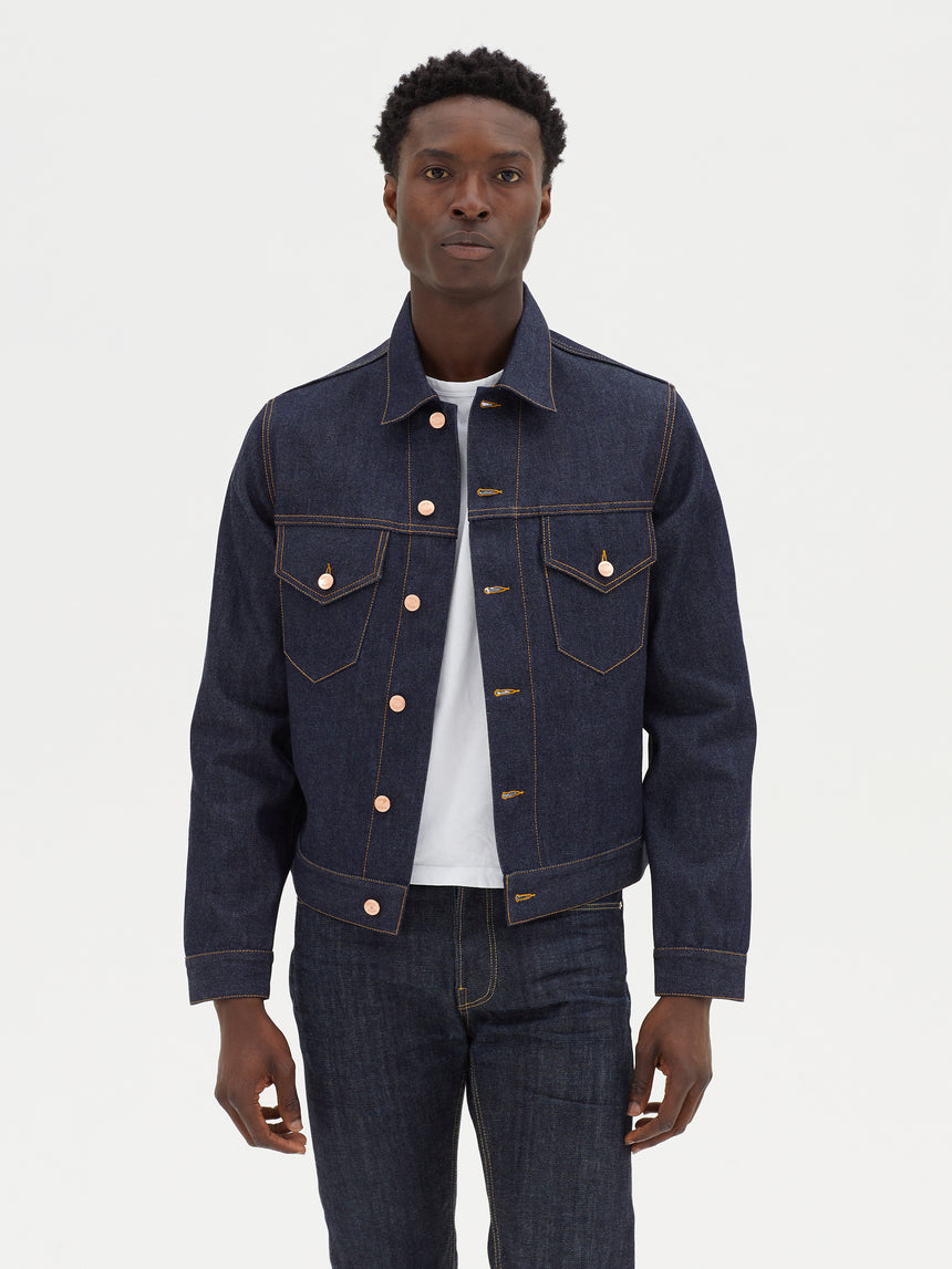 TAILORED DENIM TRUCKER JACKET IN RAW INDIGO DENIM