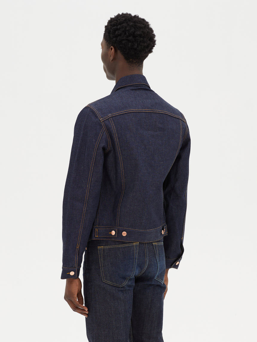TAILORED DENIM TRUCKER JACKET IN RAW INDIGO DENIM