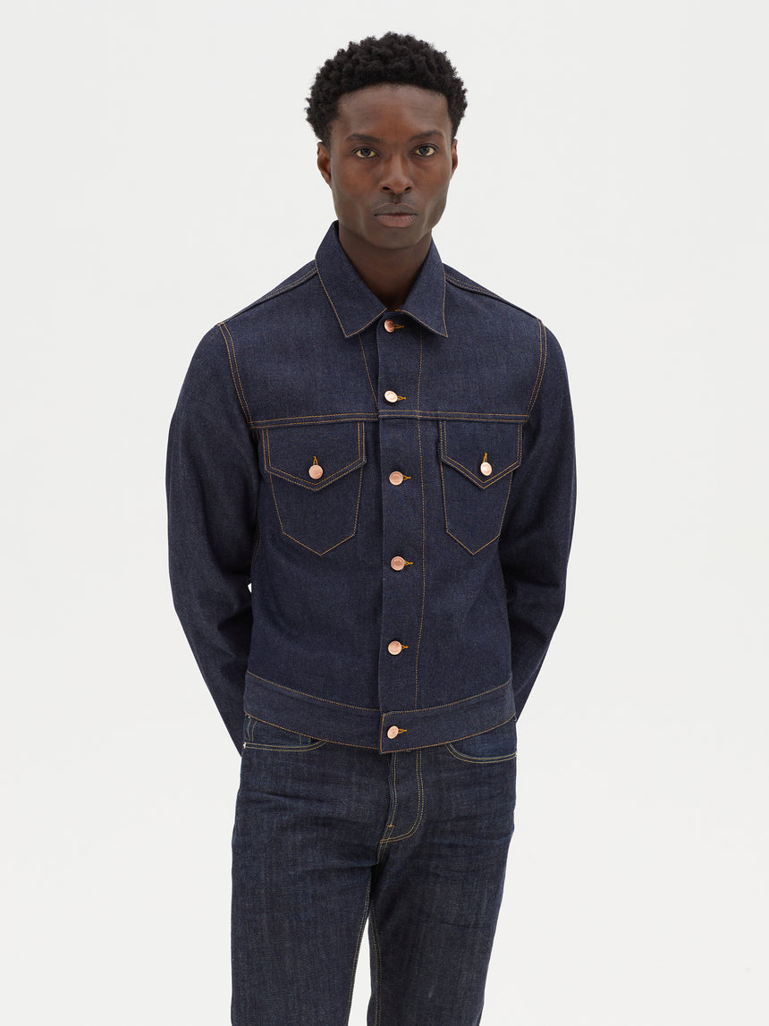 TAILORED DENIM TRUCKER JACKET IN RAW INDIGO DENIM
