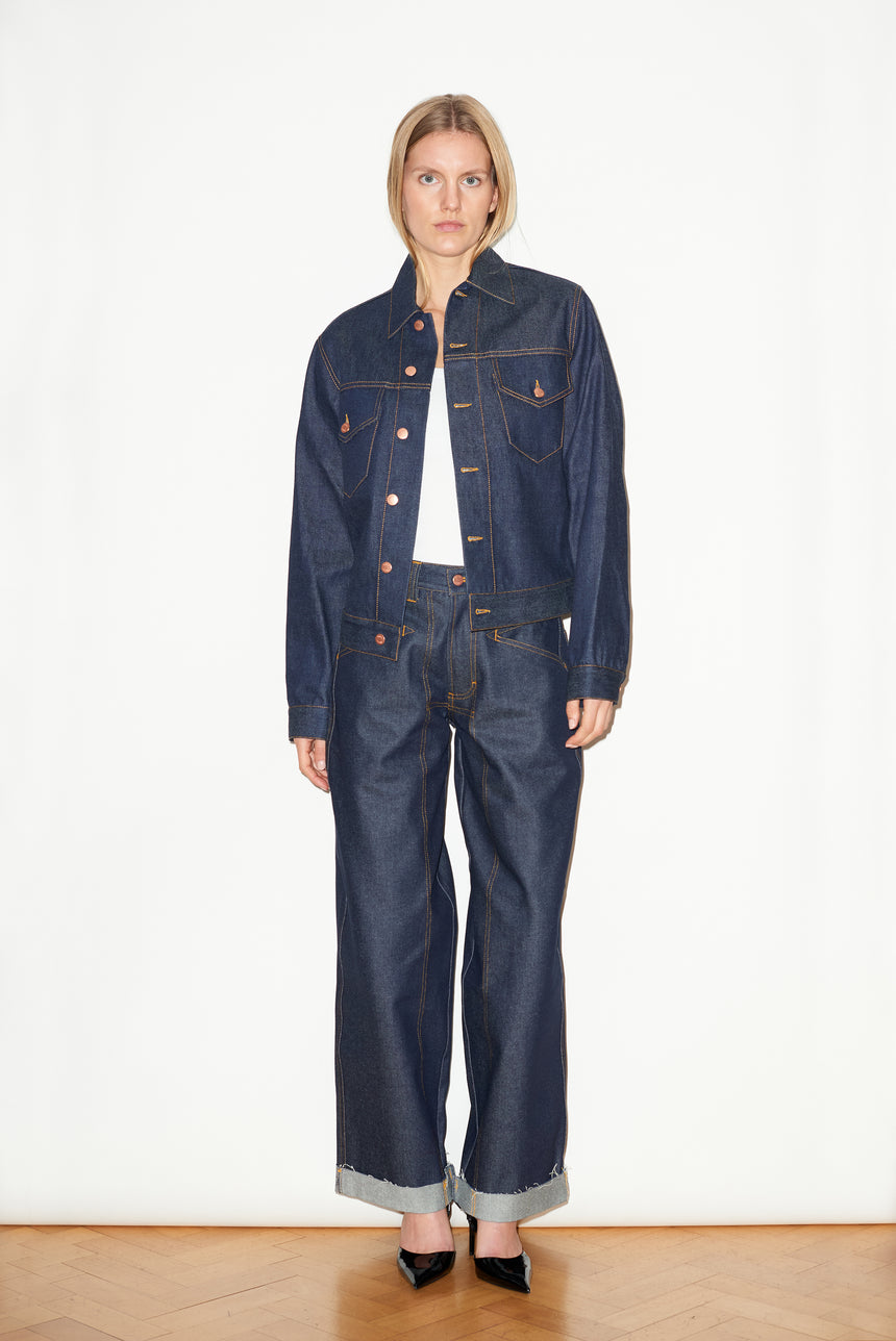 TAILORED DENIM TRUCKER JACKET IN RAW INDIGO DENIM