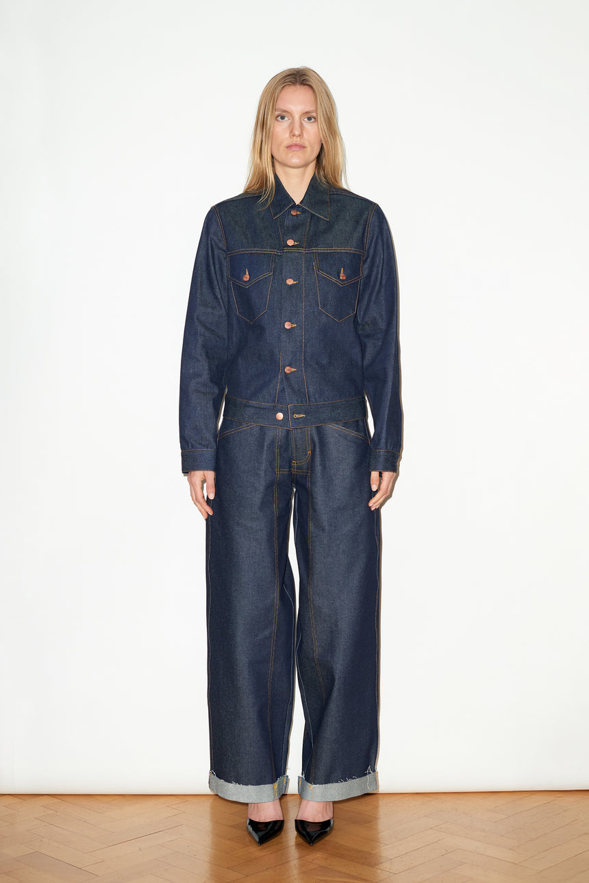 TAILORED DENIM TRUCKER JACKET IN RAW INDIGO DENIM