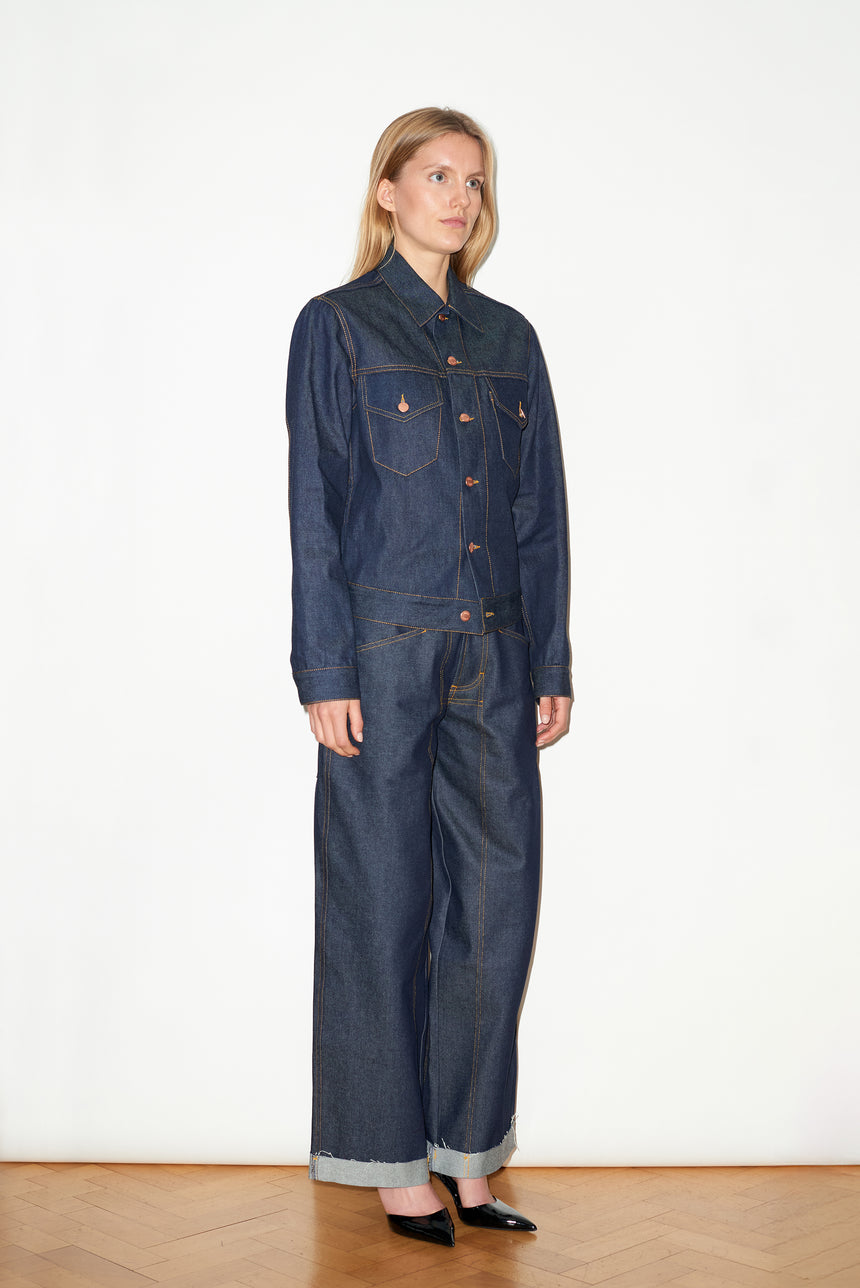 TAILORED DENIM TRUCKER JACKET IN RAW INDIGO DENIM