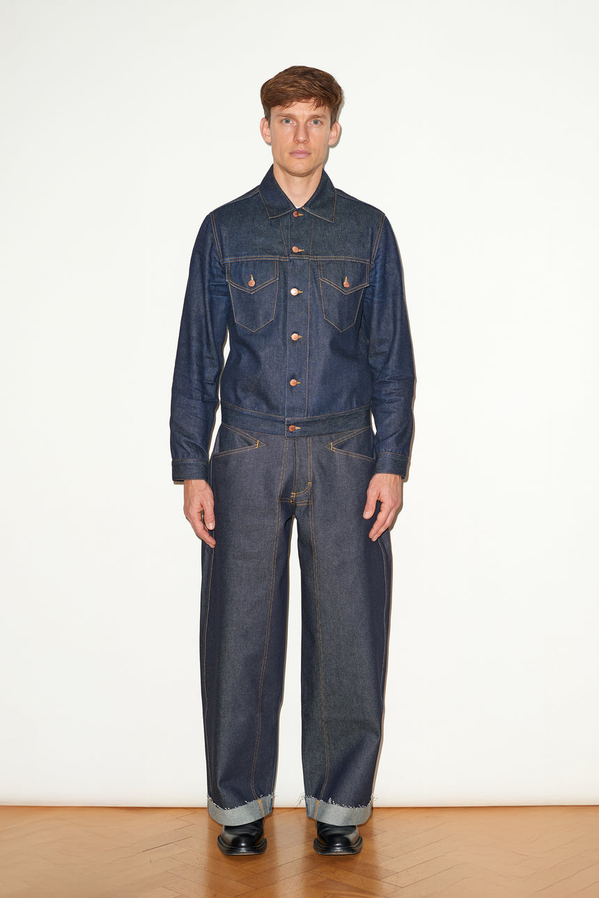 TAILORED DENIM TRUCKER JACKET IN RAW INDIGO DENIM