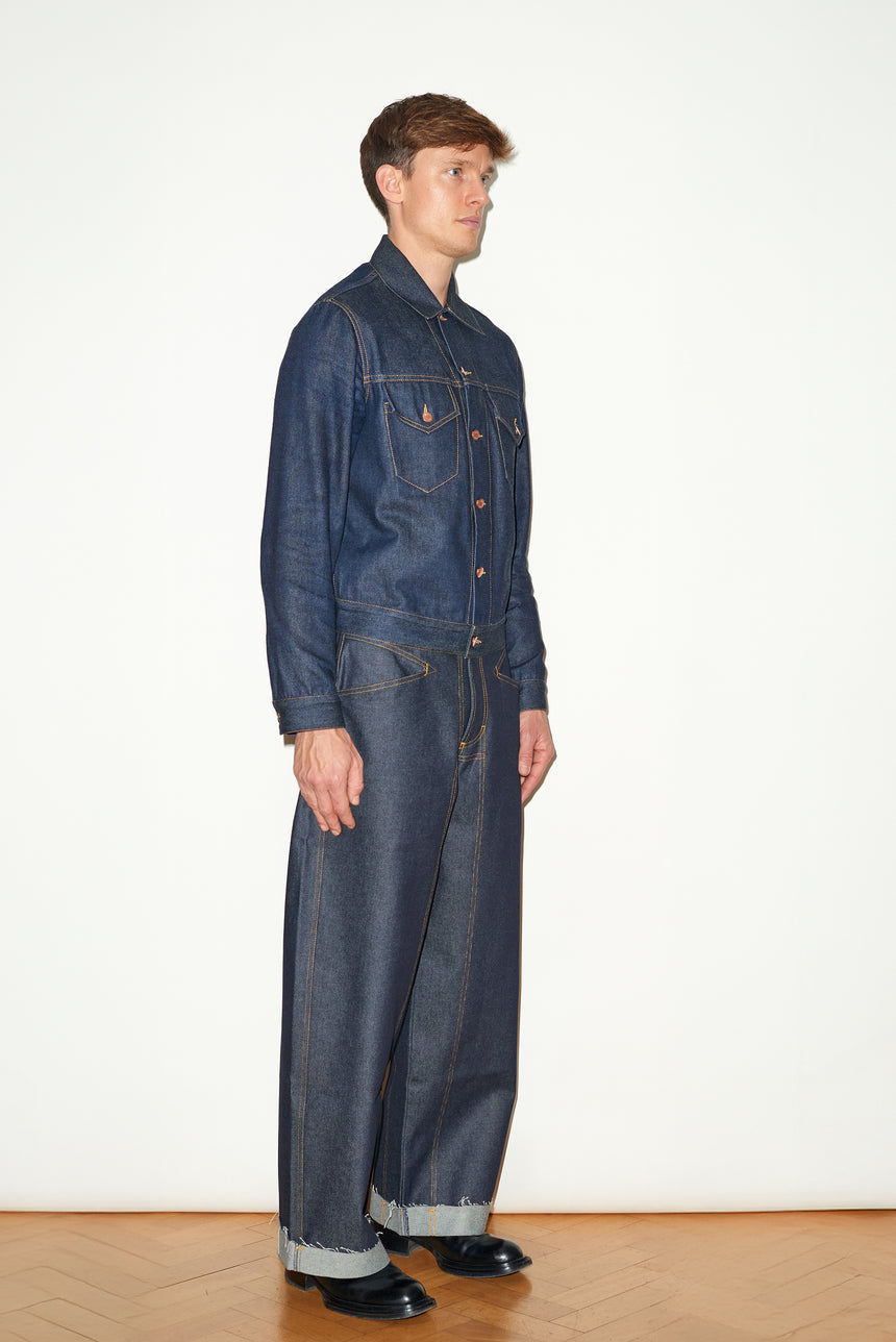 TAILORED DENIM TRUCKER JACKET IN RAW INDIGO DENIM