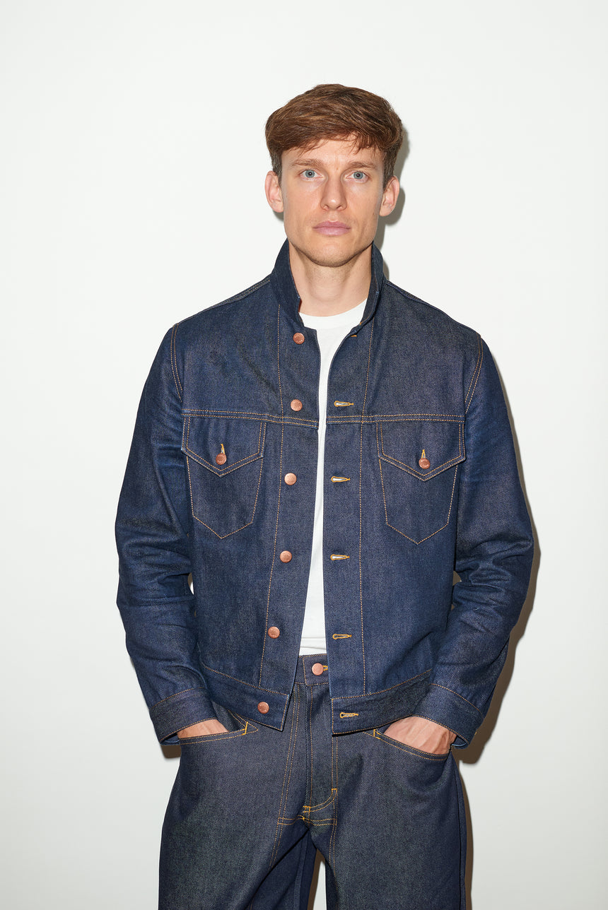 TAILORED DENIM TRUCKER JACKET IN RAW INDIGO DENIM