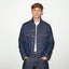 TAILORED DENIM TRUCKER JACKET IN RAW INDIGO DENIM