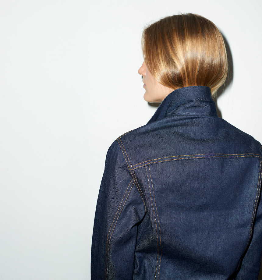 TAILORED DENIM TRUCKER JACKET IN RAW INDIGO DENIM