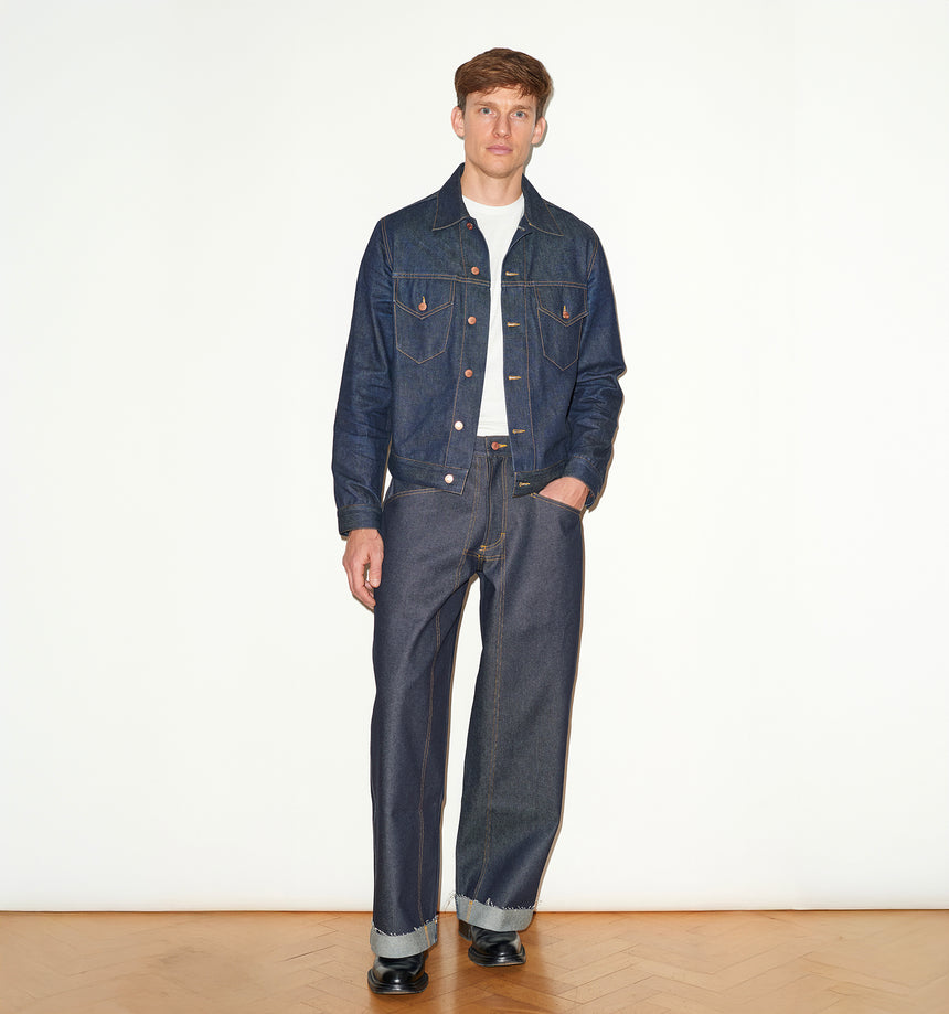 TAILORED DENIM TRUCKER JACKET IN RAW INDIGO DENIM