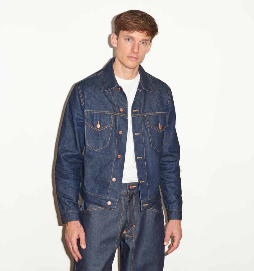 TAILORED DENIM TRUCKER JACKET IN RAW INDIGO DENIM