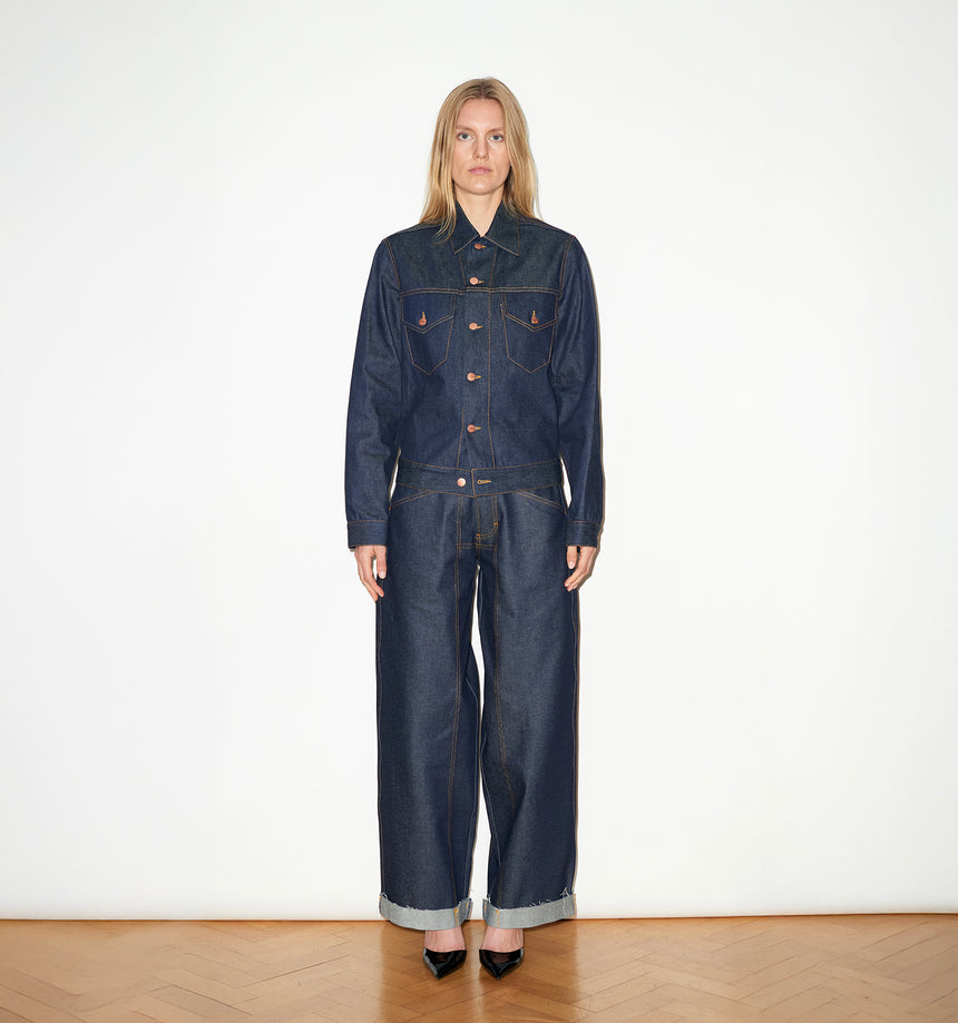 TAILORED DENIM TRUCKER JACKET IN RAW INDIGO DENIM