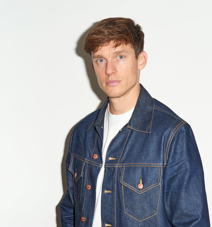 TAILORED DENIM TRUCKER JACKET IN RAW INDIGO DENIM