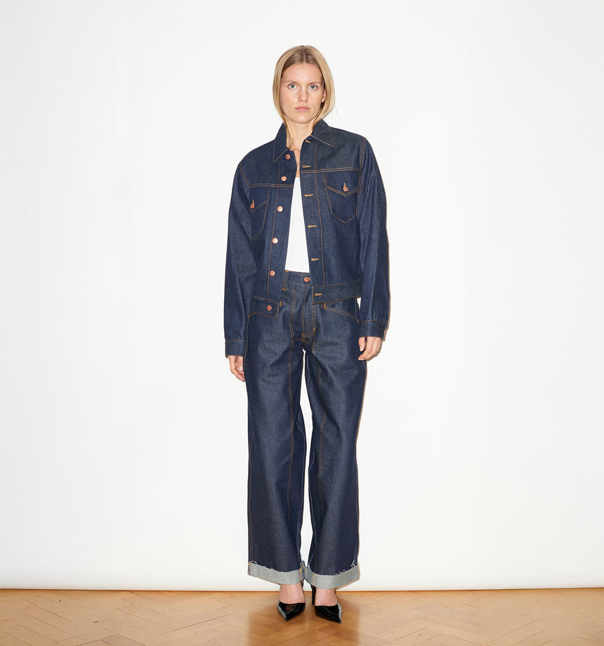 TAILORED DENIM TRUCKER JACKET IN RAW INDIGO DENIM