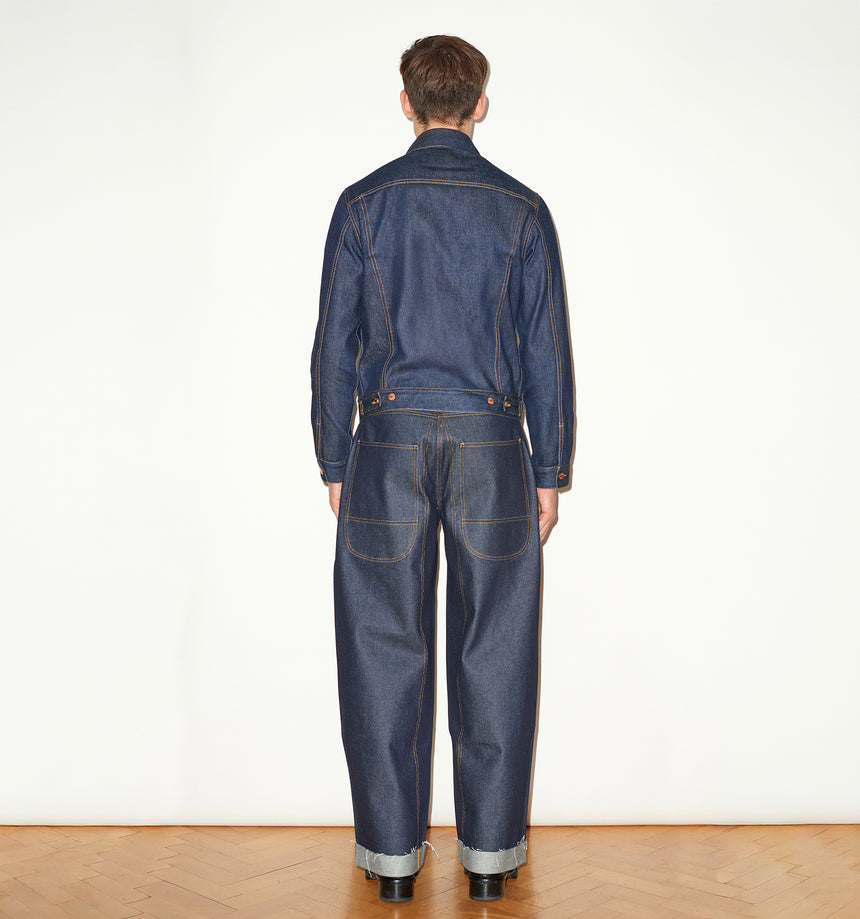 TAILORED DENIM TRUCKER JACKET IN RAW INDIGO DENIM