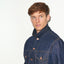 TAILORED DENIM TRUCKER JACKET IN RAW INDIGO DENIM