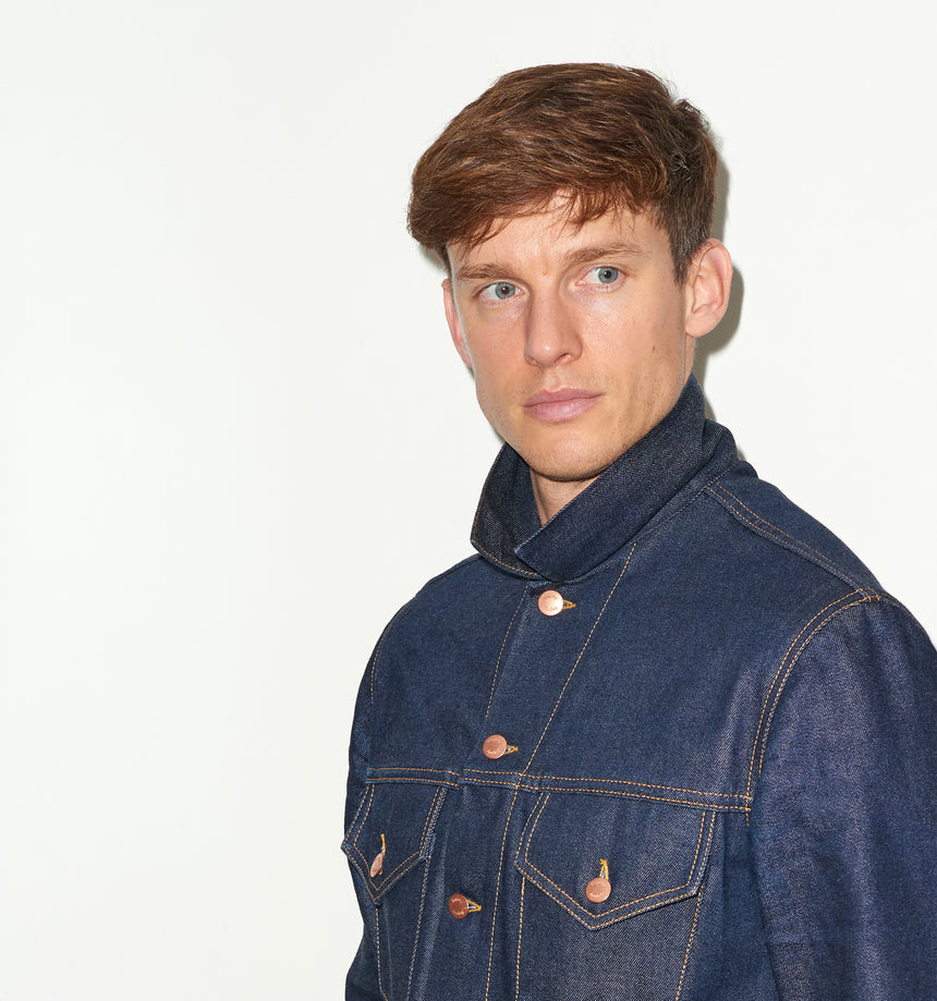 TAILORED DENIM TRUCKER JACKET IN RAW INDIGO DENIM